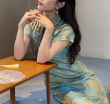 Emerald sheen cheongsam (preorder)